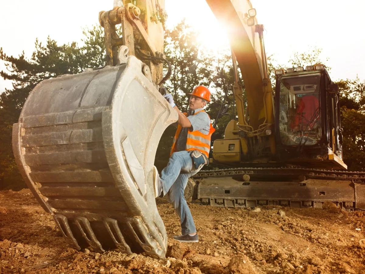 Repairman fixing a sany excavator